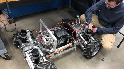Mechanical Engineering student working on large offroad remote controlled vehicle.